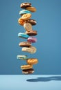 Flying donuts on blue background. 3d rendering, 3d illustration.