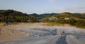 Flying downwards over mud volcanoes and lunar looking landscape