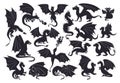 Flying dragons silhouettes. Fire breathing reptiles, winged medieval dragons mascots, scary dragons flat vector illustration set. Royalty Free Stock Photo