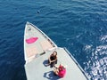 Flying drone above boat