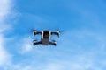 Myvatn, Iceland - 10 March 2020: Flying drone Dji Mavic Air against the blue sky