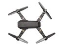 Flying drone with four propellers and  camera for shooting video and photos. Black drone top view isolated on white background Royalty Free Stock Photo