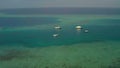 Flying a drone over a group of small boats standing on an island Royalty Free Stock Photo