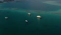 Flying a drone over a group of small boats standing on an island Royalty Free Stock Photo