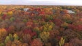 Flying with a drone from right to left showing bright colors of Autumn