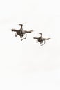 Flying drones with camera, quadcopters on white