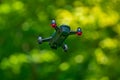 flying drones on green background blurred