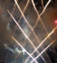 Flying fireworks in the night sky. Line trackrs create a pattern of a cage. head of the comet and its light path.
