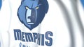 Flying flag with Memphis Grizzlies team logo, close-up. Editorial 3D rendering