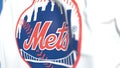 Flying flag with New York Mets team logo, close-up. Editorial 3D rendering