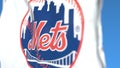 Flying flag with New York Mets team logo, close-up. Editorial 3D rendering