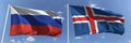 Flying flags of Russia and Iceland on sky background, 3d rendering