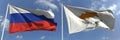 Flying flags of Russia and Cyprus on high flagpoles. 3d rendering