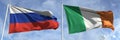 Flying flags of Russia and Ireland on sky background, 3d rendering
