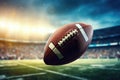 Flying Football Over the Field: A dramatic close-up of an American football in flight, dominating the field