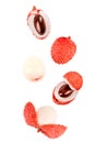 Flying fresh lychee fruits on white background Royalty Free Stock Photo