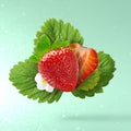 Flying Fresh tasty ripe strawberry with green leaves Royalty Free Stock Photo