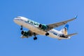 Flying Frontier Airlines aircraft Royalty Free Stock Photo