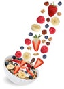 Flying fruit muesli with fruits like raspberry, banana and straw