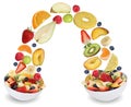 Flying fruit salad in bowl with fruits like apples, oranges, pea