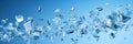 Flying glass fragments on a blue background. Wide format banner