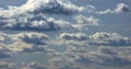 Flying through heavenly beautiful sunny cloudscape. Amazing timelapse of golden fluffy clouds moving softly on the sky