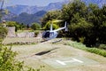 A flying helicopter bringing tourists to a luxury beautiful hotel in Ravello, Italy