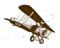 Flying antique biplane pitching down Royalty Free Stock Photo