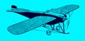 Flying historic racing monoplane aircraft on a blue background