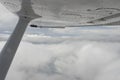 Flying above clouds in Cessna aircraft