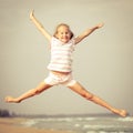 Flying jump beach girl on blue sea shore Royalty Free Stock Photo