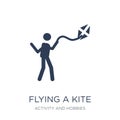 flying a kite icon. Trendy flat vector flying a kite icon on white background from Activity and Hobbies collection Royalty Free Stock Photo