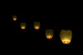 Flying lantern in the dark sky Royalty Free Stock Photo