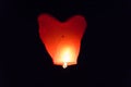 Flying lantern in the dark sky Royalty Free Stock Photo