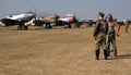 Two re-enactors dressed as pilot and ground crew.