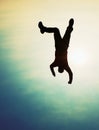 Flying man. Young man falling down on sky background. Royalty Free Stock Photo