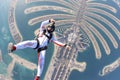 Flying men on Dubai Palm Royalty Free Stock Photo