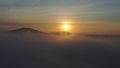 Flying in the middle of the clouds - dawn over the sea and mountains, Primorsky Krai, Russia