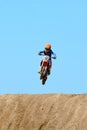 Flying motocross rider Royalty Free Stock Photo