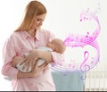 Flying music notes and happy mother and her baby. Lullaby songs