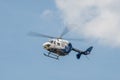 Flying N124AM helicopter against a clear blue sky Royalty Free Stock Photo