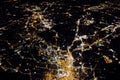 Flying at night over citiesbelow