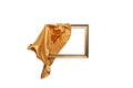 Flying orange satin cloth unveiling golden frame, abstract new product launch backdrop Royalty Free Stock Photo