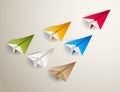 Flying origami plane leading the team group of smaller planes, business leadership concept.