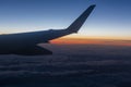 Flying over the clouds in evening