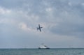 A-10 flying over Coast Guard ship on Lake Michigan at the 2022 Chicago Air Show Royalty Free Stock Photo