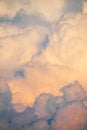 Flying over the evening clouds with the late sun. Flight through moving cloudscape with beautiful sun rays. Royalty Free Stock Photo