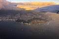 Flying over Honolulu, Hawaii with views of Diamond Head crater below Royalty Free Stock Photo