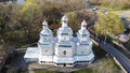 Flying over orthodox cossacks old wooden church in Ukraine. Aerial drone shot.