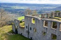 Flying over the ruins of the Hohentwil castle and countryside under sunlight Royalty Free Stock Photo